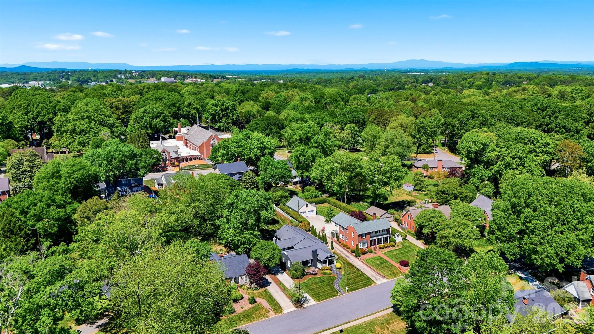 543 5th Street Northwest Hickory, NC 28601 - Photo 41 of 43 an aerial view of residential house with outdoor space and trees all around