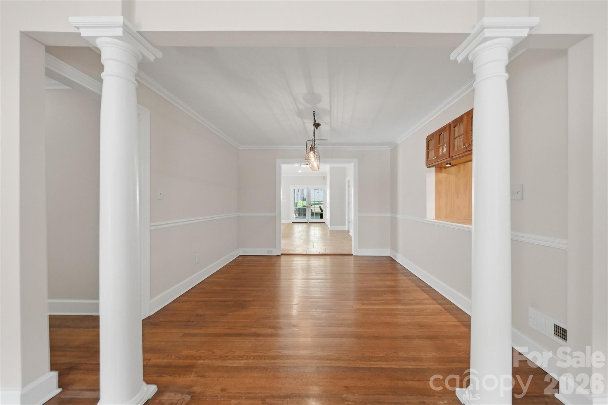543 5th Street Northwest Hickory, NC 28601 - Photo 7 of 43 a view of an empty room with wooden floor and a window