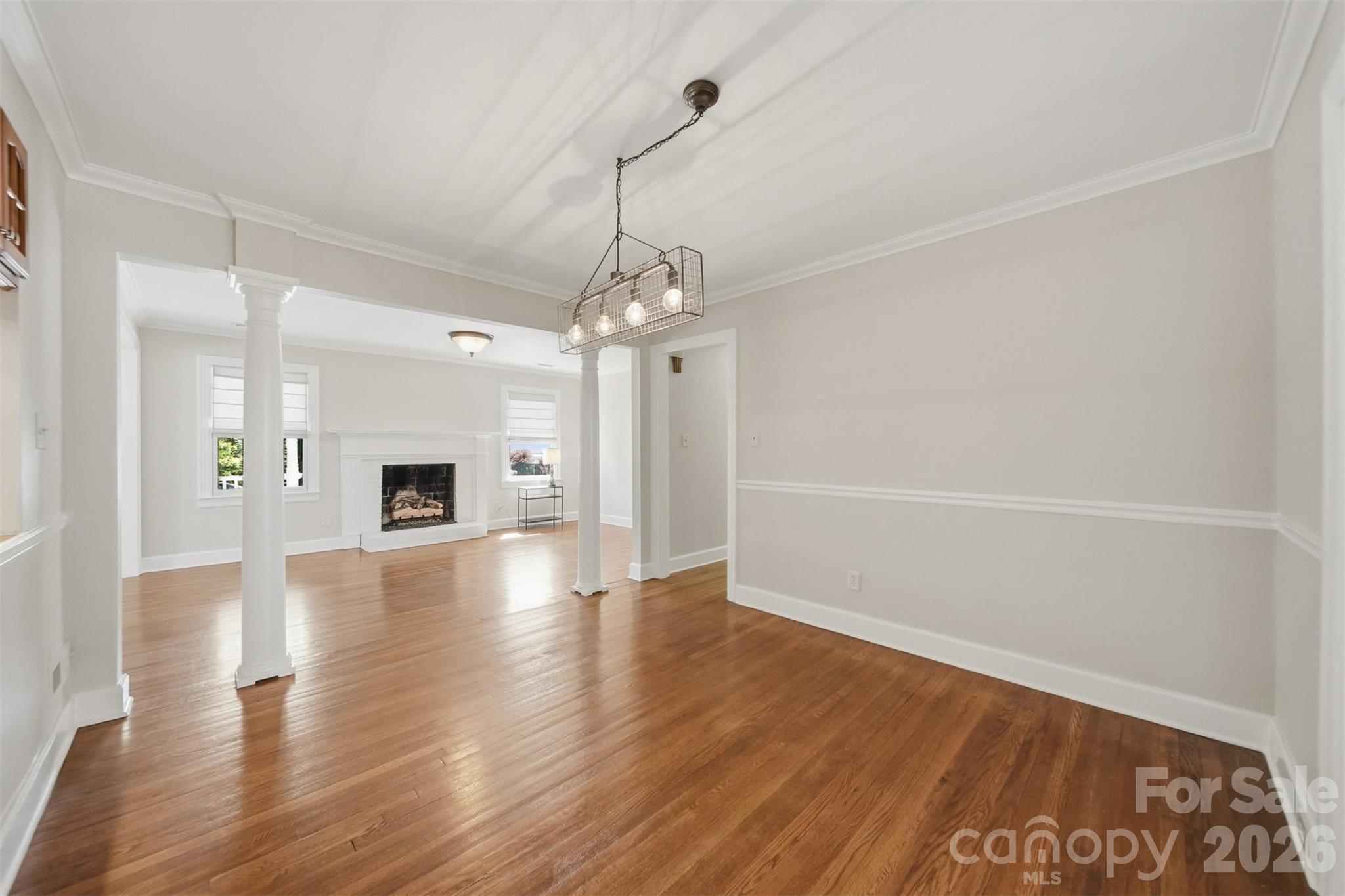 543 5th Street Northwest Hickory, NC 28601 - Photo 9 of 43 a view of an empty room with wooden floor and a window