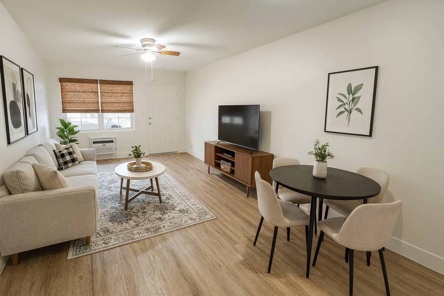 3850 Northeast 21st Way, Unit 62 Lighthouse Point, FL 33064 - Photo 2 of 13 a living room with furniture a window and a flat screen tv