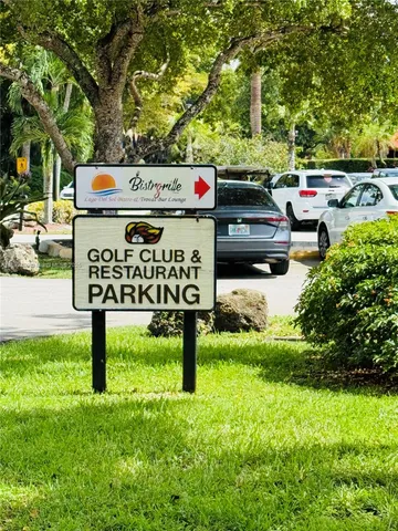 a sign that is on a brick wall