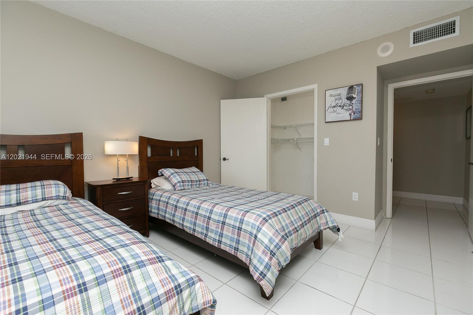 8855 Collins Avenue, Unit 6F Surfside, FL 33154 - Photo 12 of 26 with a closet