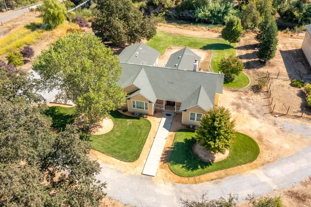 a view of a house with a swimming pool