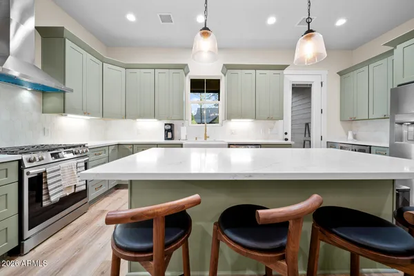 a view of a hallway with wooden shelves