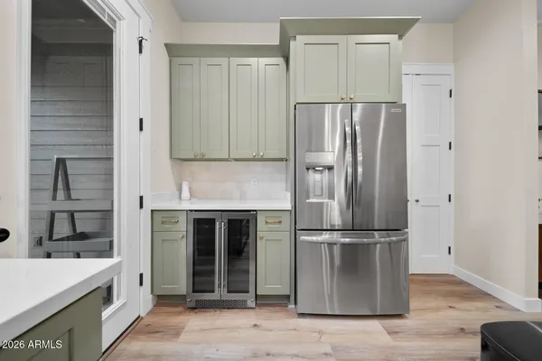 a kitchen with a sink and cabinets