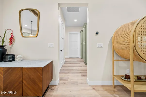 a spacious bedroom with a large bed and a window