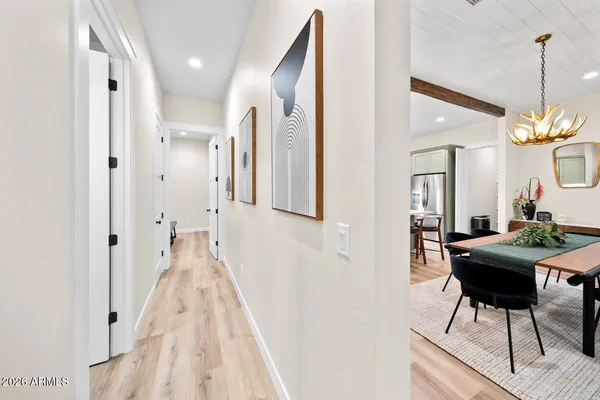 a view of a room with furniture and windows