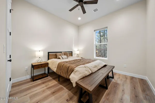 a view of a house with a yard and garage