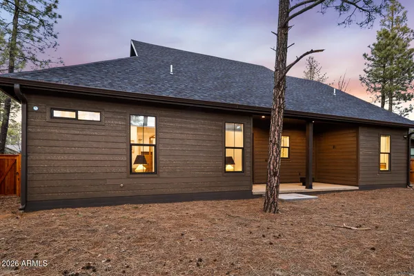 a view of a yard with a bench