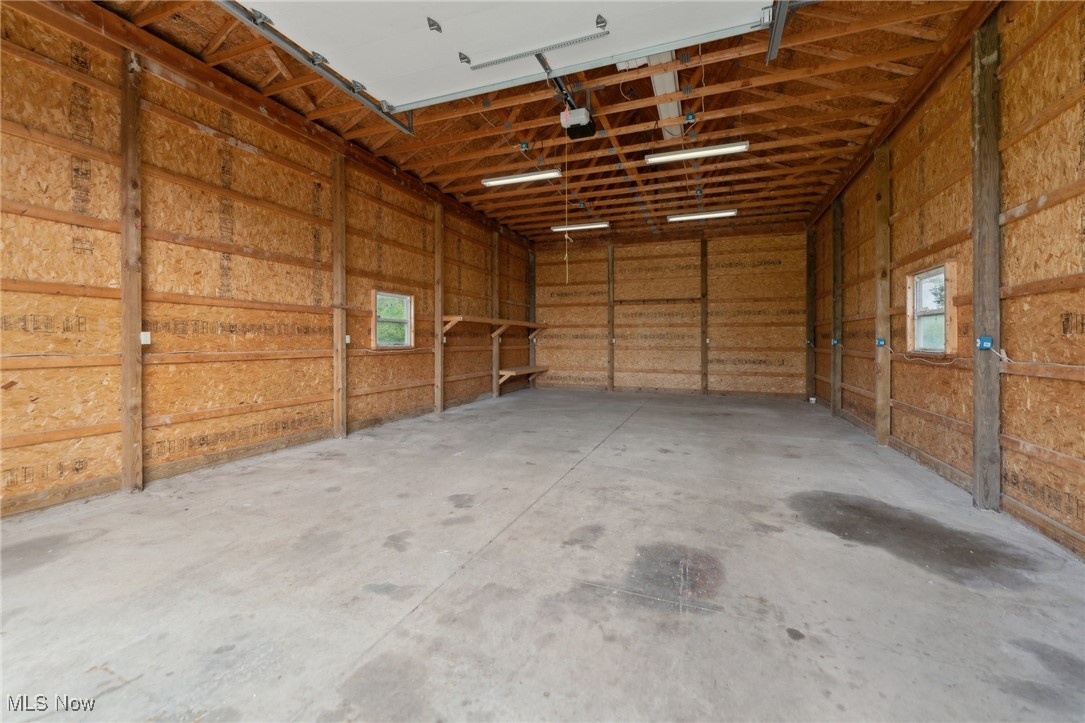 45230 Cemetery Road Wellington, OH 44090 - Photo 45 of 50 Garage with a garage door opener