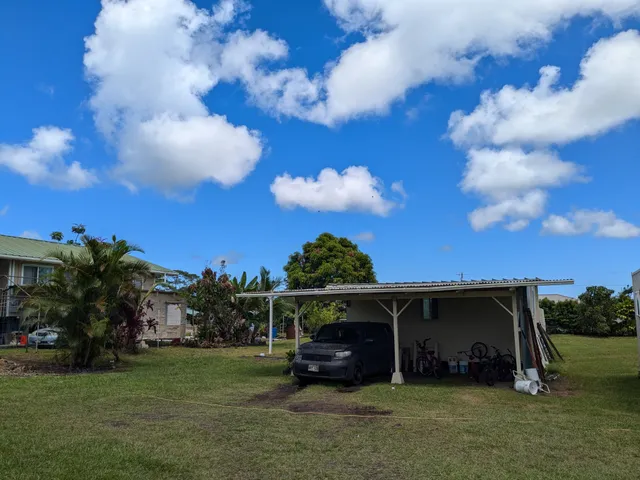 a view of a car in front of house