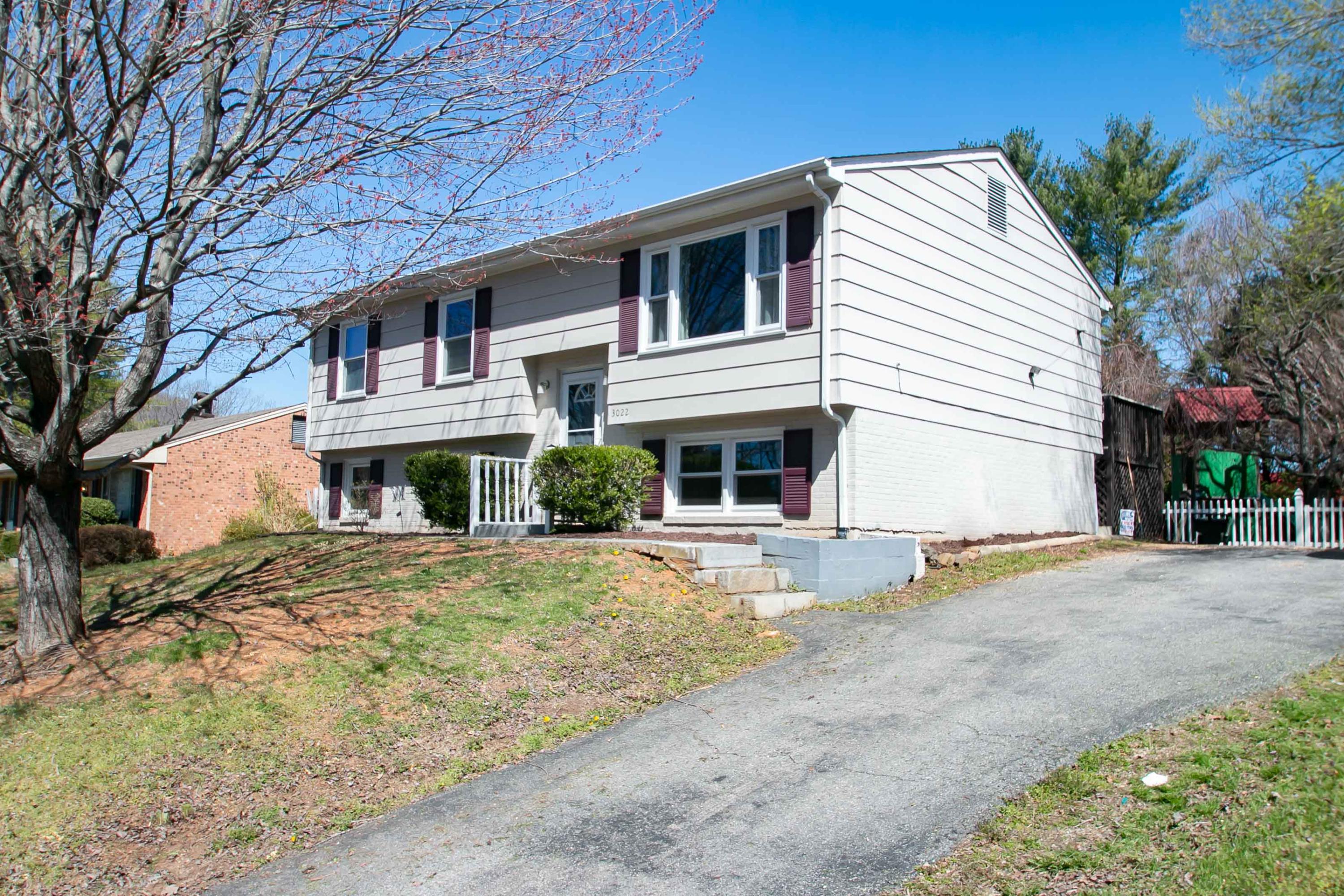 3022 Bandy Road Roanoke, VA 24014 - Photo 1 of 50 a front view of a house with a yard and garage