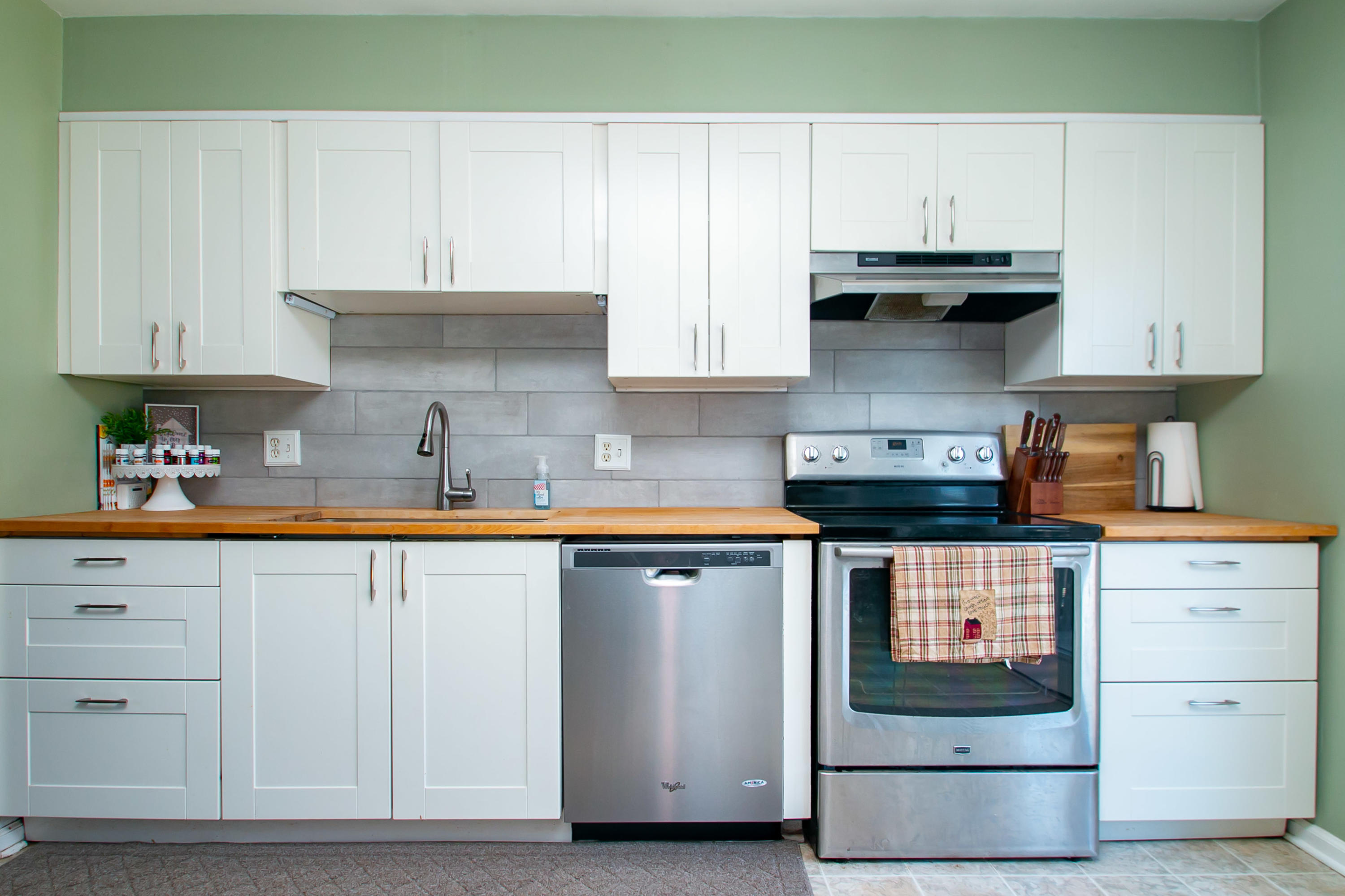 3022 Bandy Road Roanoke, VA 24014 - Photo 12 of 50 a kitchen with stainless steel appliances granite countertop a sink and cabinets