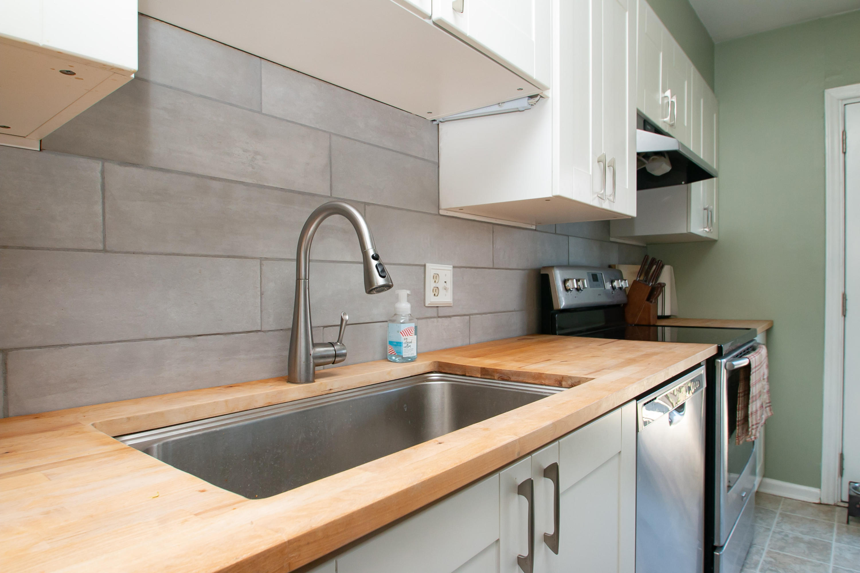 3022 Bandy Road Roanoke, VA 24014 - Photo 14 of 50 a kitchen with a sink and cabinets