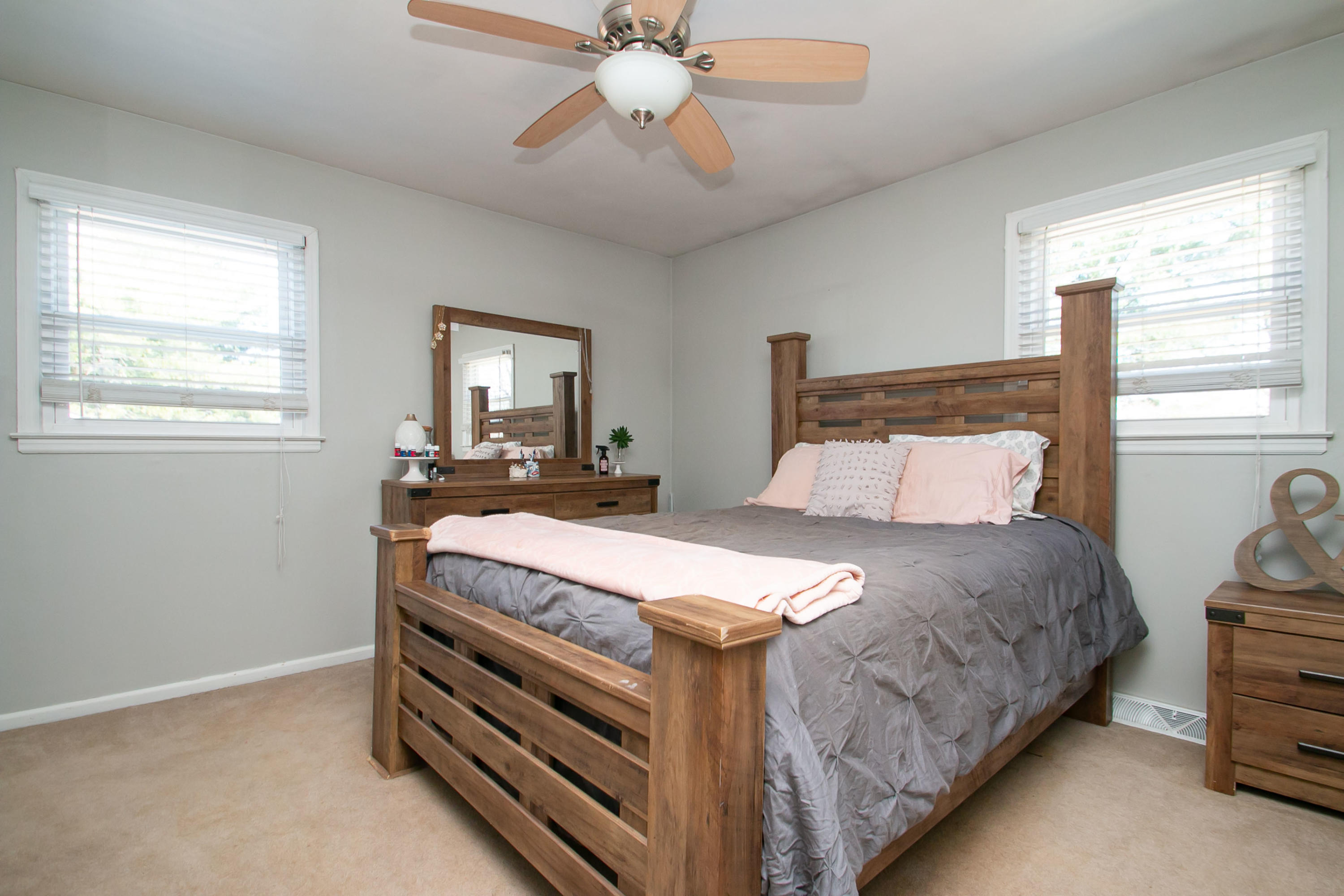 3022 Bandy Road Roanoke, VA 24014 - Photo 17 of 50 a bed sitting in a bedroom next to a window