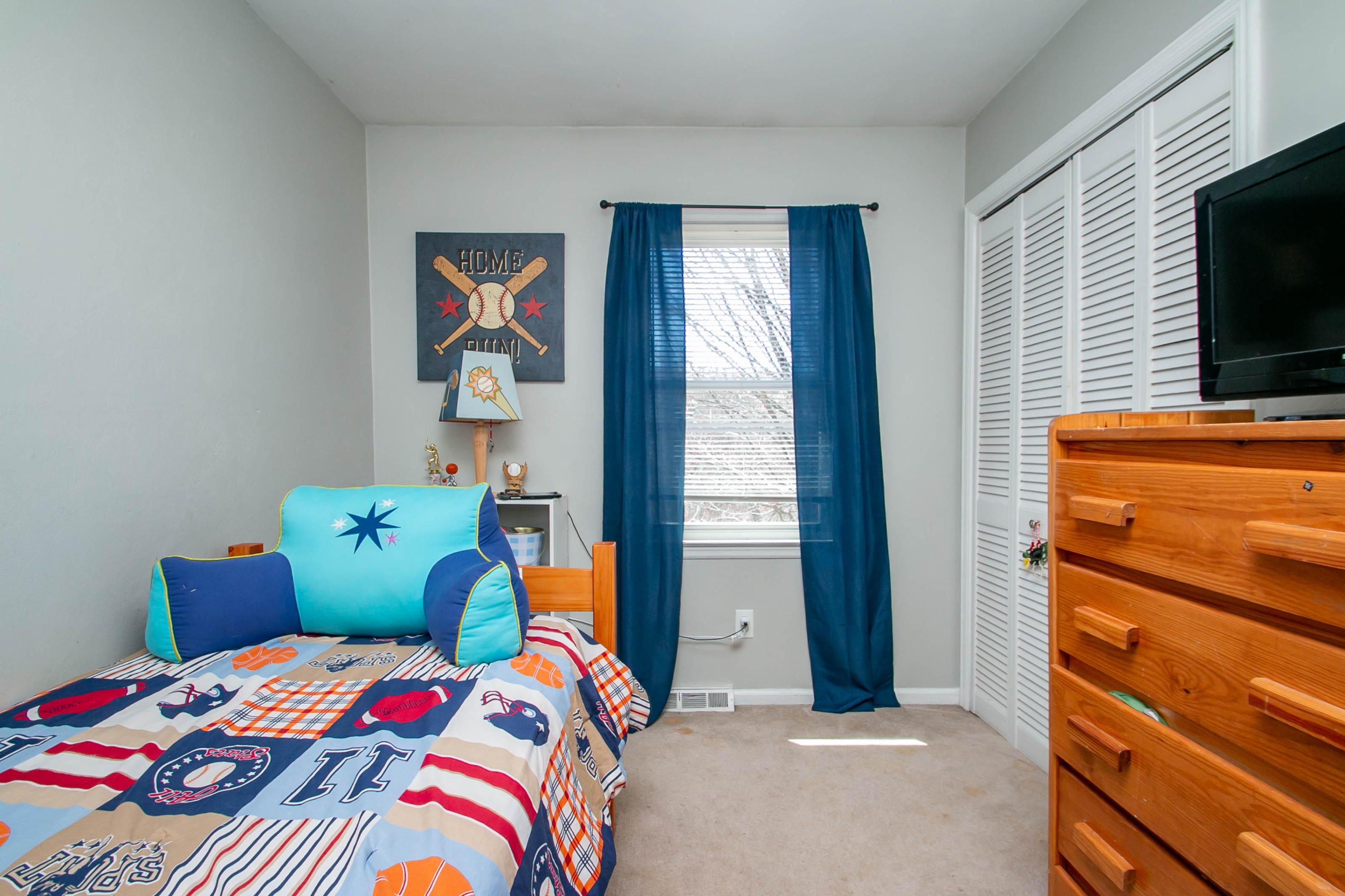 3022 Bandy Road Roanoke, VA 24014 - Photo 27 of 50 a bedroom with a bed and a flat screen tv