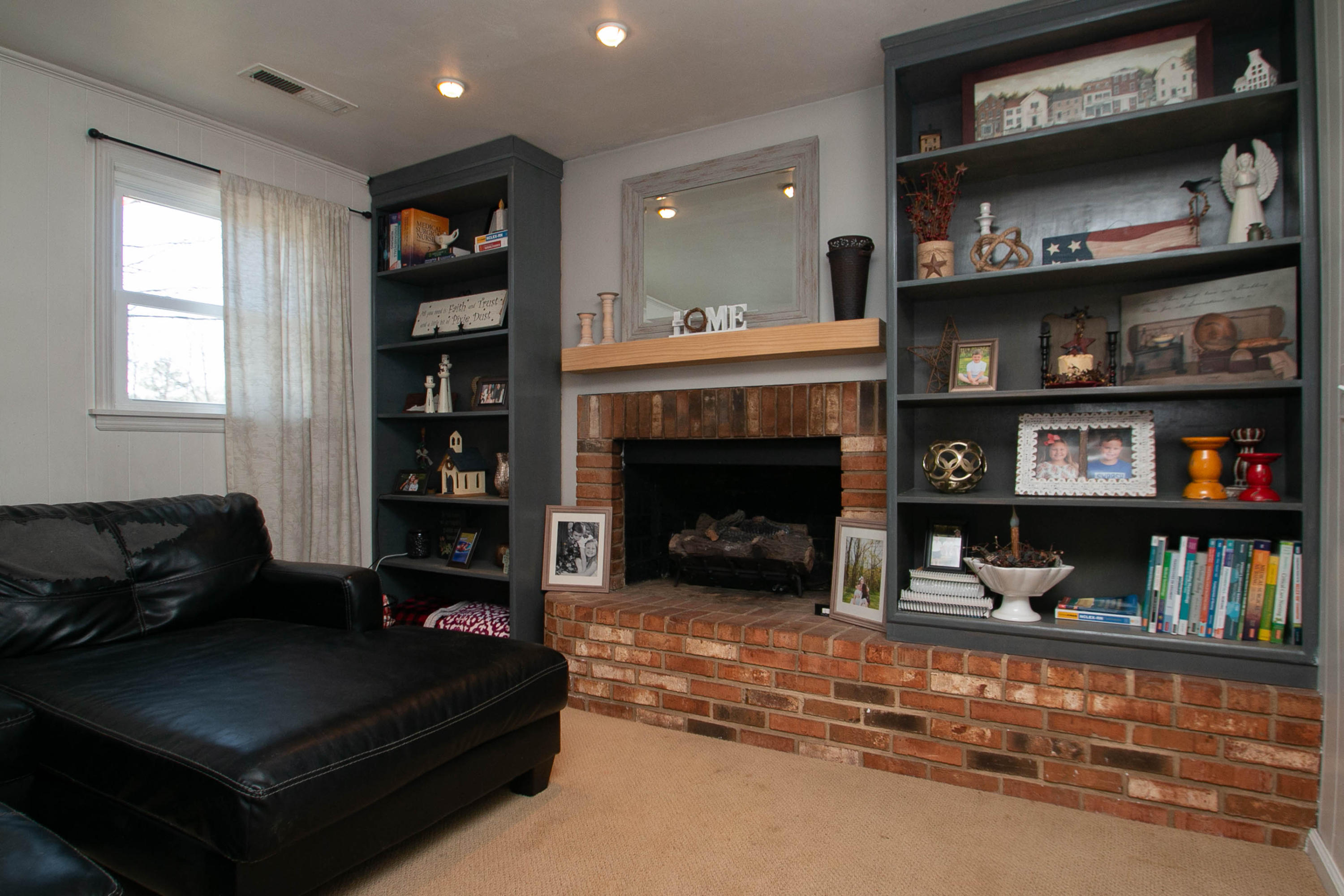 3022 Bandy Road Roanoke, VA 24014 - Photo 31 of 50 a living room with furniture and a fireplace