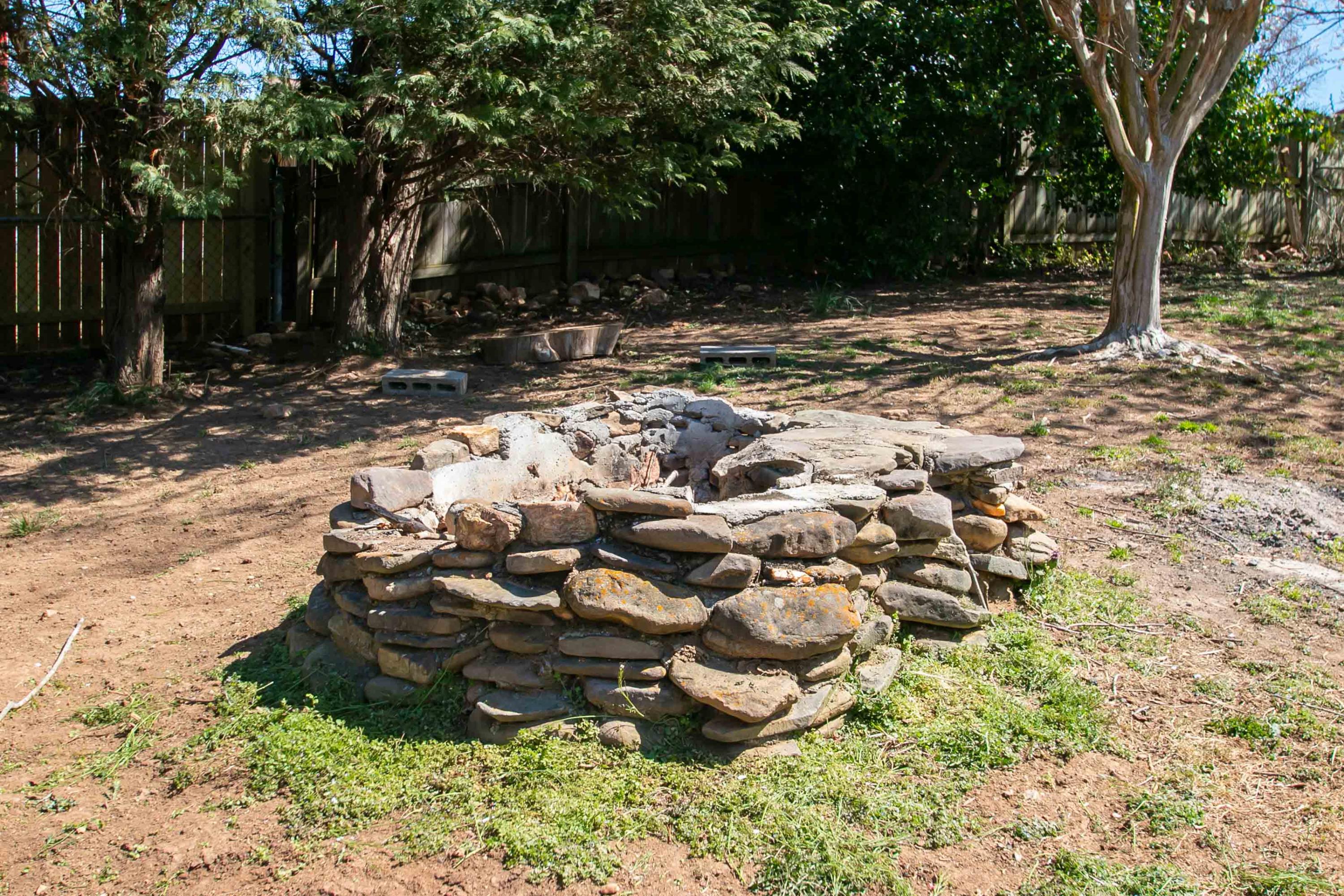 3022 Bandy Road Roanoke, VA 24014 - Photo 44 of 50 a view of a fire pit with large trees
