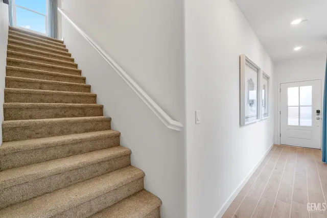 a view of entryway with wooden floor