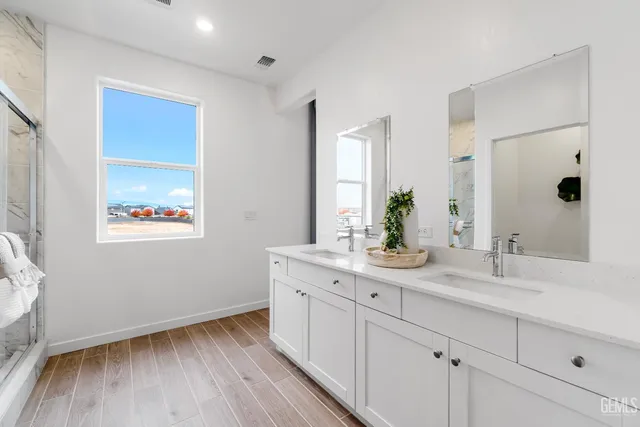 a bathroom with a shower and a toilet