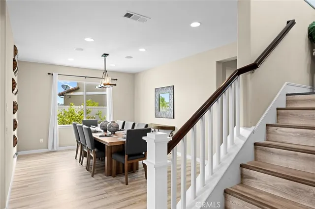 a white bath tub sitting in a bathroom next to a window