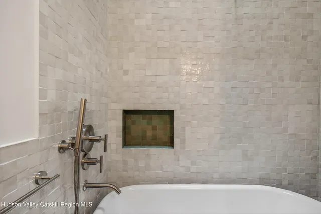 a bathroom with a sink and a bathtub