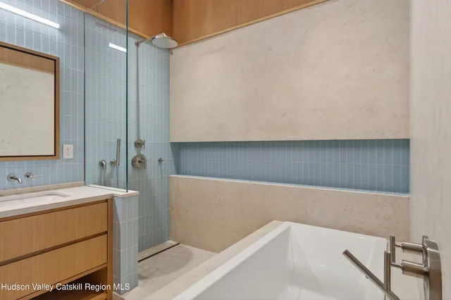 a bathroom with a sink and a bathtub