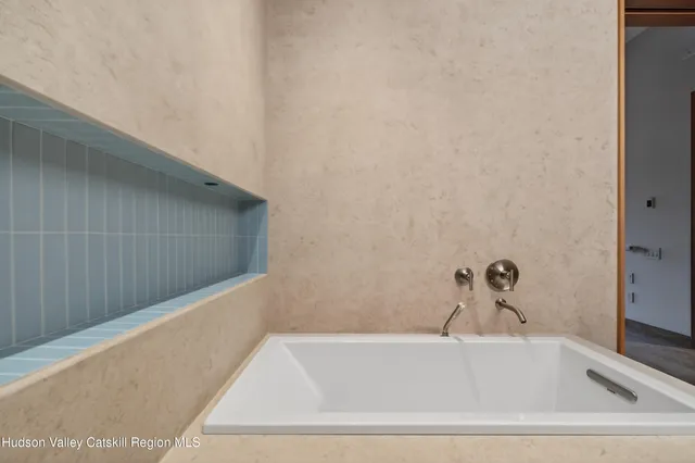 a bathroom with a bathtub