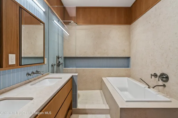 a bathroom with a sink and a bathtub