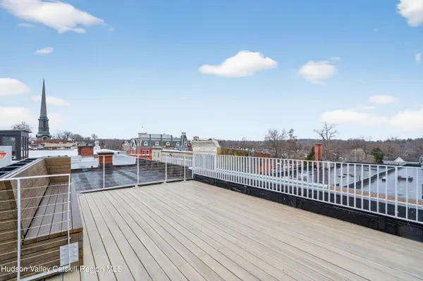 a view of a terrace with a lake