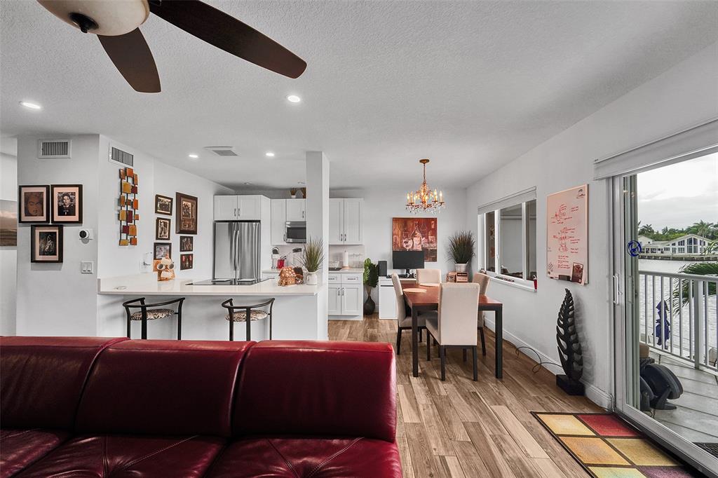 1201 South Riverside Drive, Unit 204 Pompano Beach, FL 33062 - Photo 18 of 48 a living room with furniture and a large window
