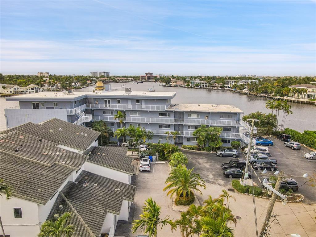 1201 South Riverside Drive, Unit 204 Pompano Beach, FL 33062 - Photo 31 of 48 an aerial view of a house with a garden and lake view