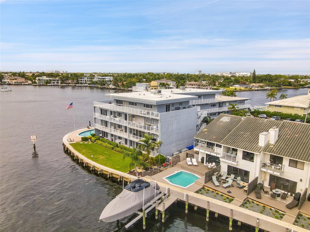 1201 South Riverside Drive, Unit 204 Pompano Beach, FL 33062 - Photo 32 of 48 an aerial view of a house with outdoor space and lake view in back