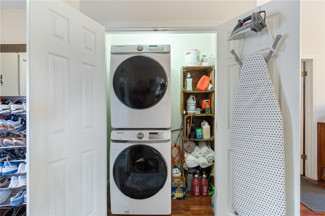 7128 Lake Bluff Road Wolcott, NY 14590 - Photo 28 of 43 1st floor laundry in the entryway room with washer