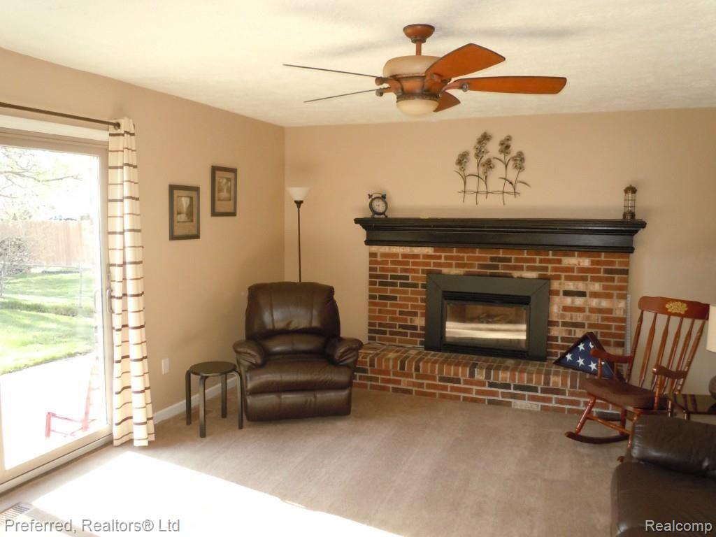 8334 Mannington Road Canton, MI 48187 - Photo 16 of 26 FAMILY ROOM WITH DOORWALL TO PATIO & FENCED YARD