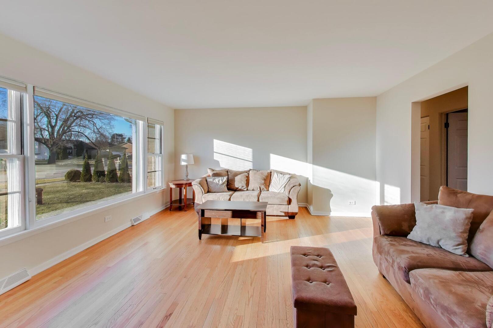 4N405 2nd Avenue Addison, IL 60101 - Photo 2 of 30 a living room with furniture and a large window