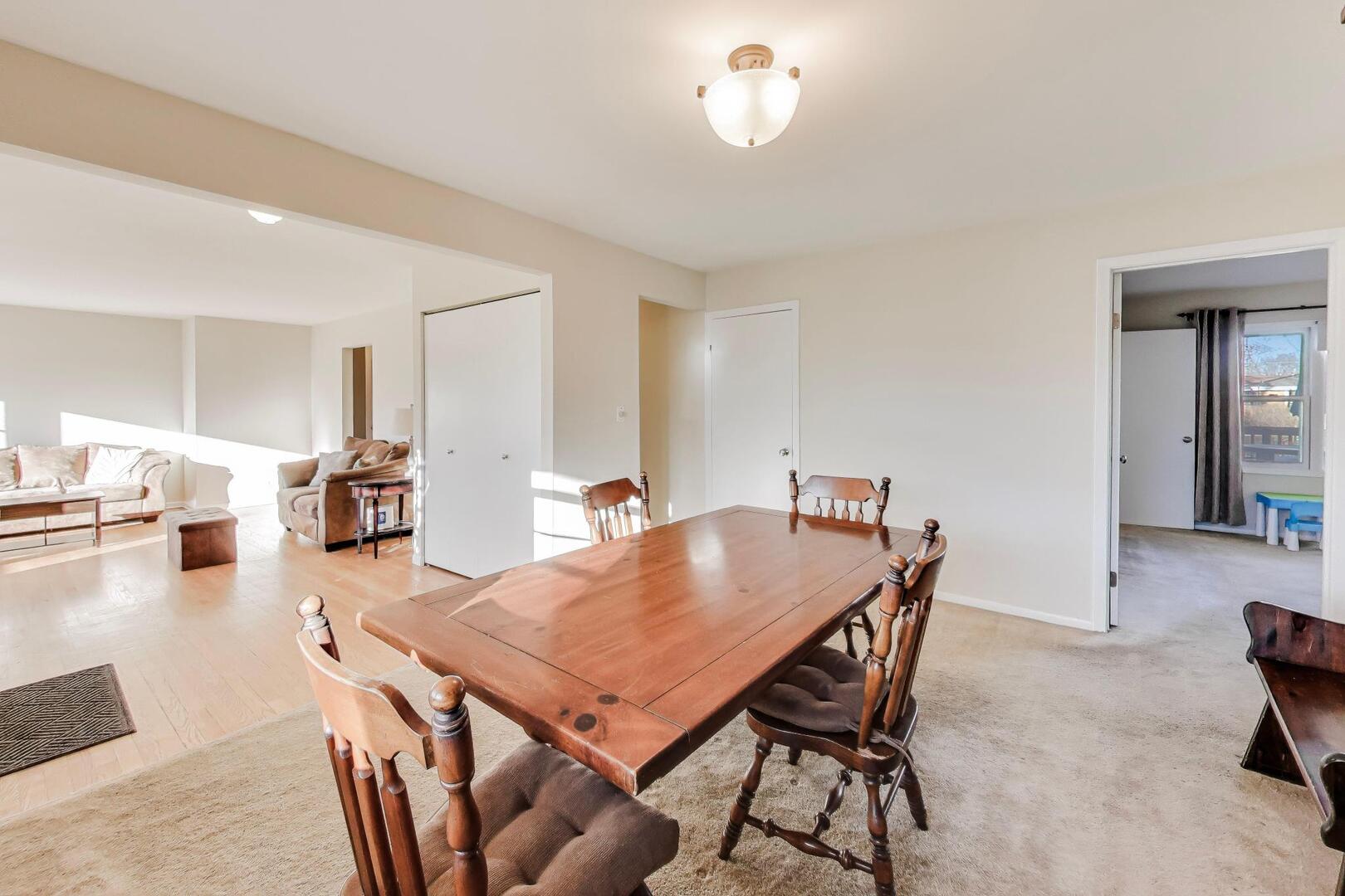 4N405 2nd Avenue Addison, IL 60101 - Photo 4 of 30 a view of a dining room with furniture and wooden floor