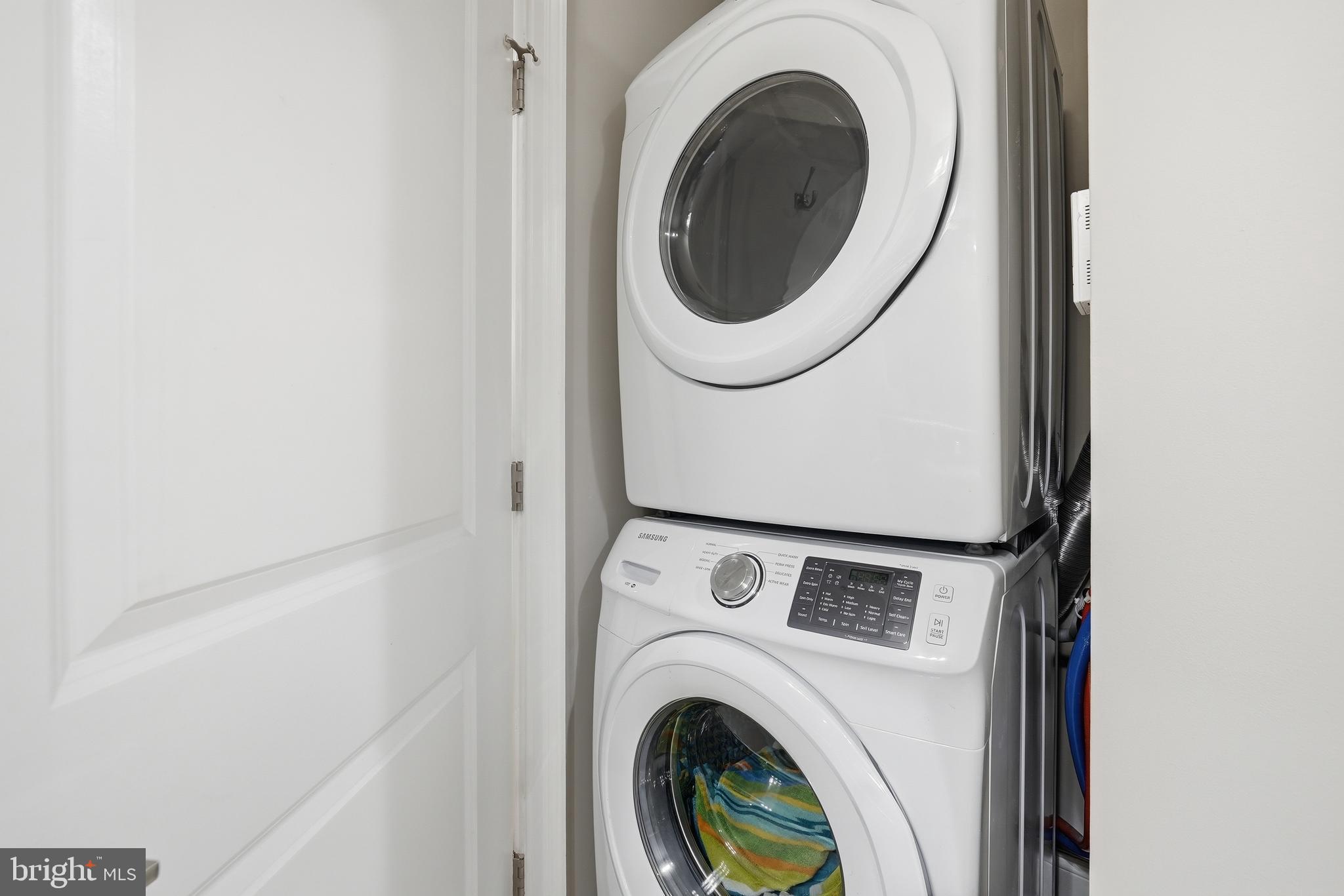 6301 Edsall Road, Unit 519 Alexandria, VA 22312 - Photo 7 of 33 a utility room with dryer and washer