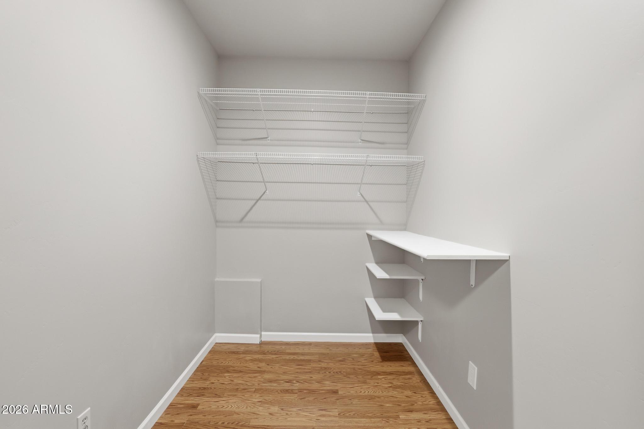 408 East Phoenix Street Payson, AZ 85541 - Photo 28 of 35 a view of walk in closet with empty racks