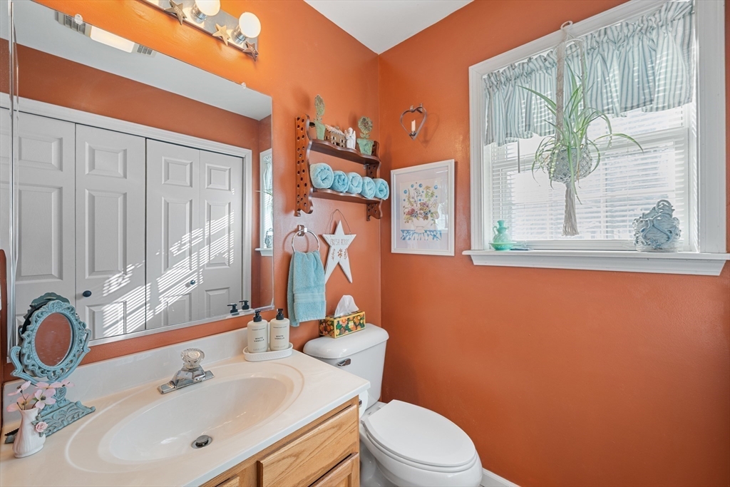 5 Glen Echo Shore Road Charlton, MA 01507 - Photo 20 of 42 a bathroom with a sink a toilet and a mirror