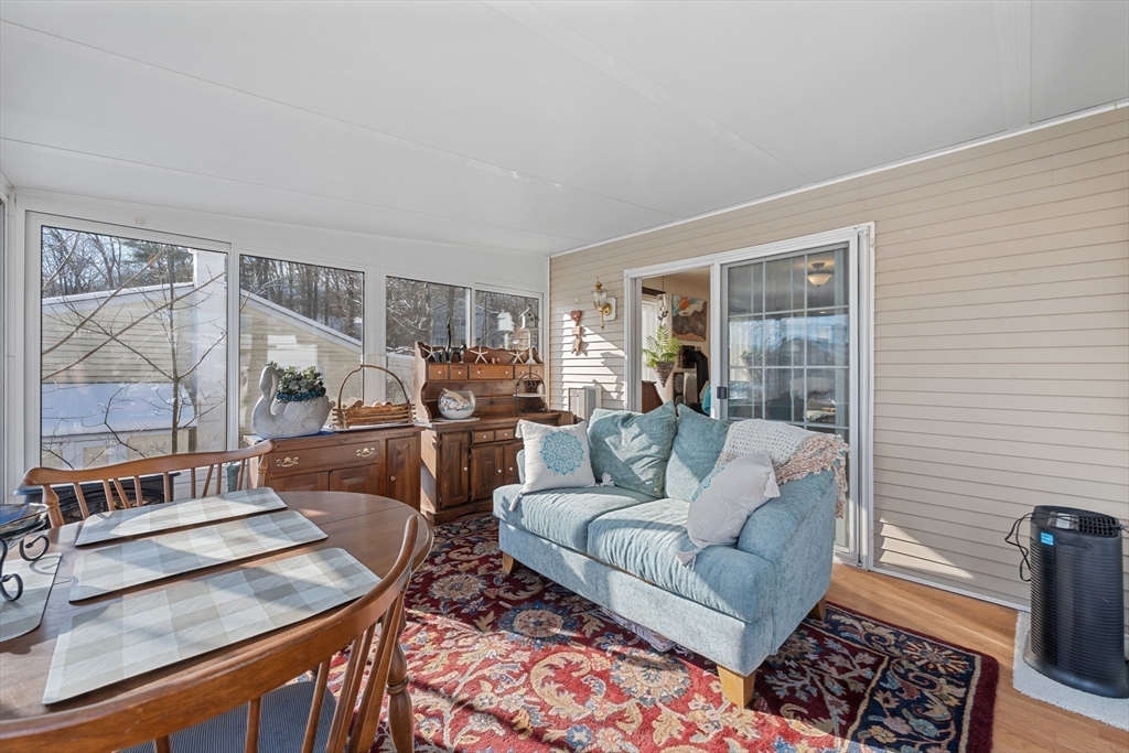 5 Glen Echo Shore Road Charlton, MA 01507 - Photo 21 of 42 a living room with furniture and a table