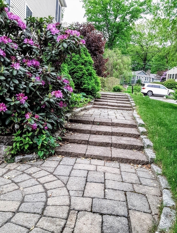5 Glen Echo Shore Road Charlton, MA 01507 - Photo 38 of 42 a view of a yard with flowers and trees
