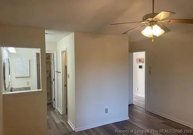 a bathroom with a glass door shower