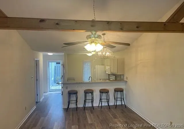 a bathroom with a sink and a window