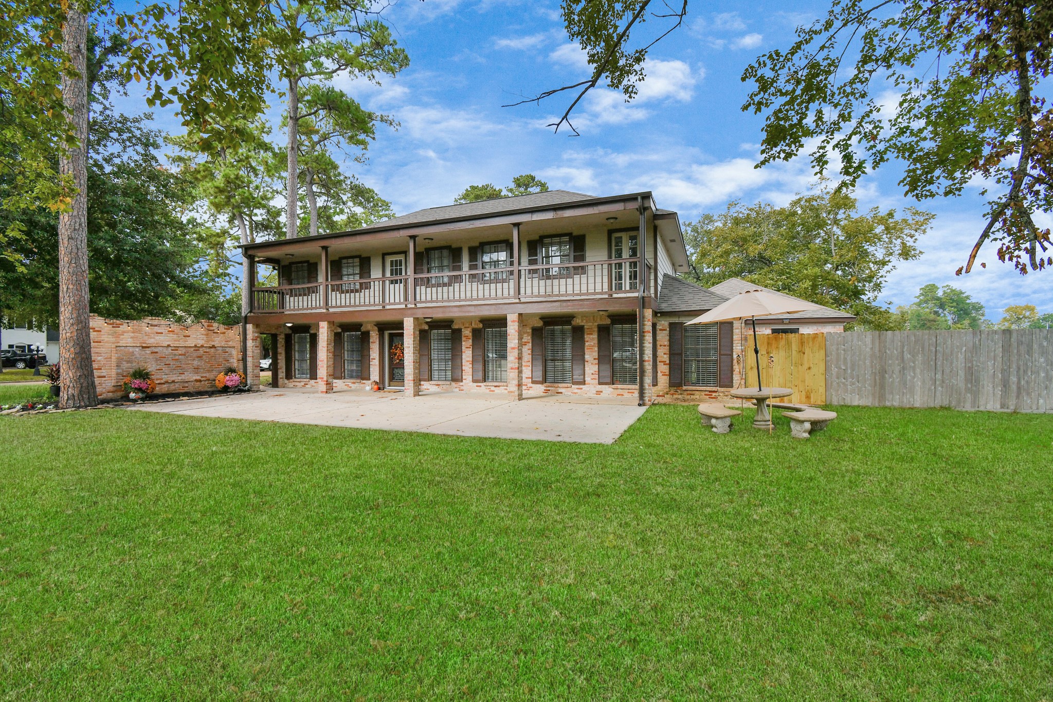 7502 Ralick Court Spring, TX 77379 - Photo 2 of 42 a view of house with backyard space and garden