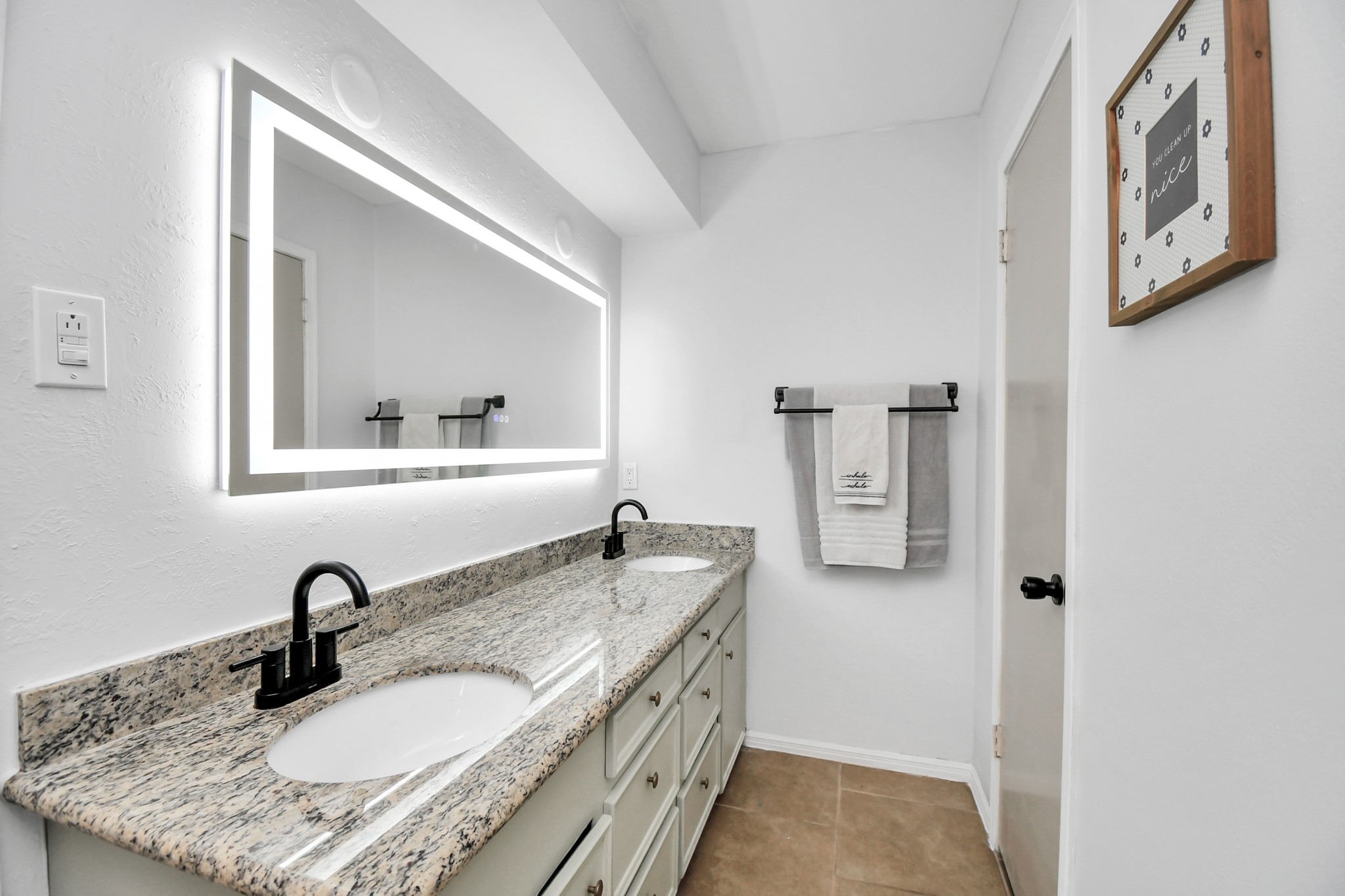 7502 Ralick Court Spring, TX 77379 - Photo 30 of 42 a bathroom with a granite countertop sink and a mirror