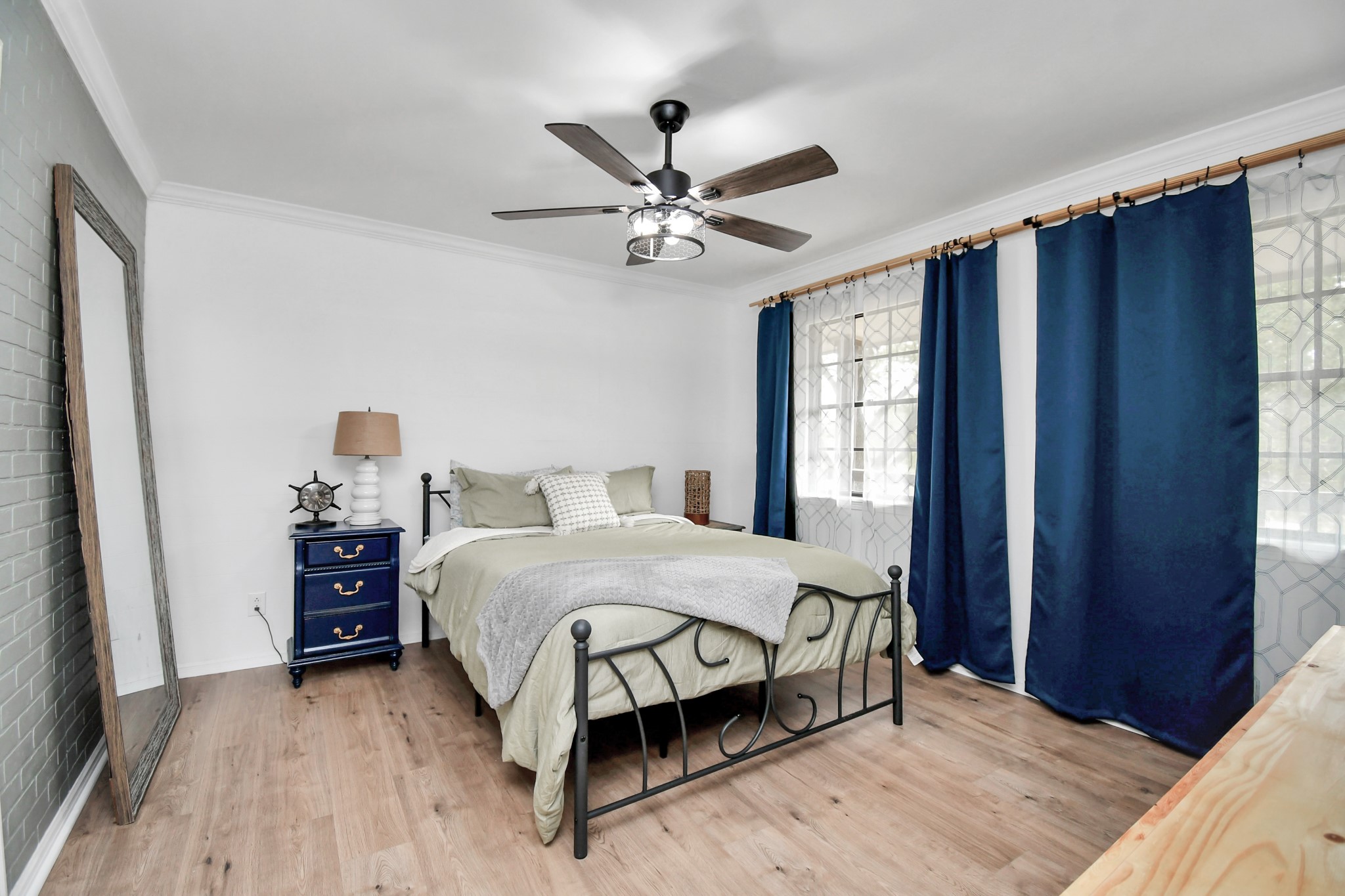 7502 Ralick Court Spring, TX 77379 - Photo 32 of 43 a bedroom with a bed and window