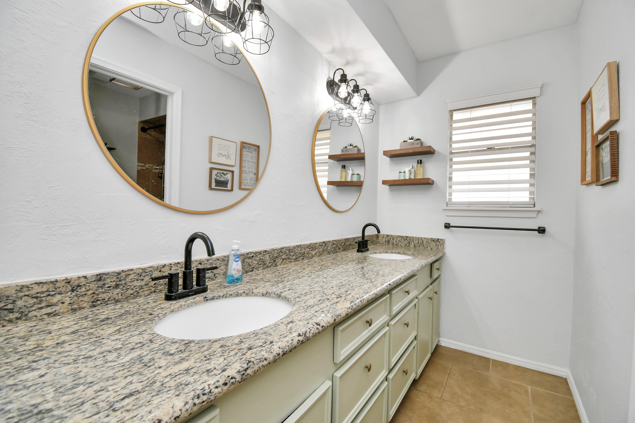 7502 Ralick Court Spring, TX 77379 - Photo 36 of 42 a bathroom with a granite countertop sink and a mirror