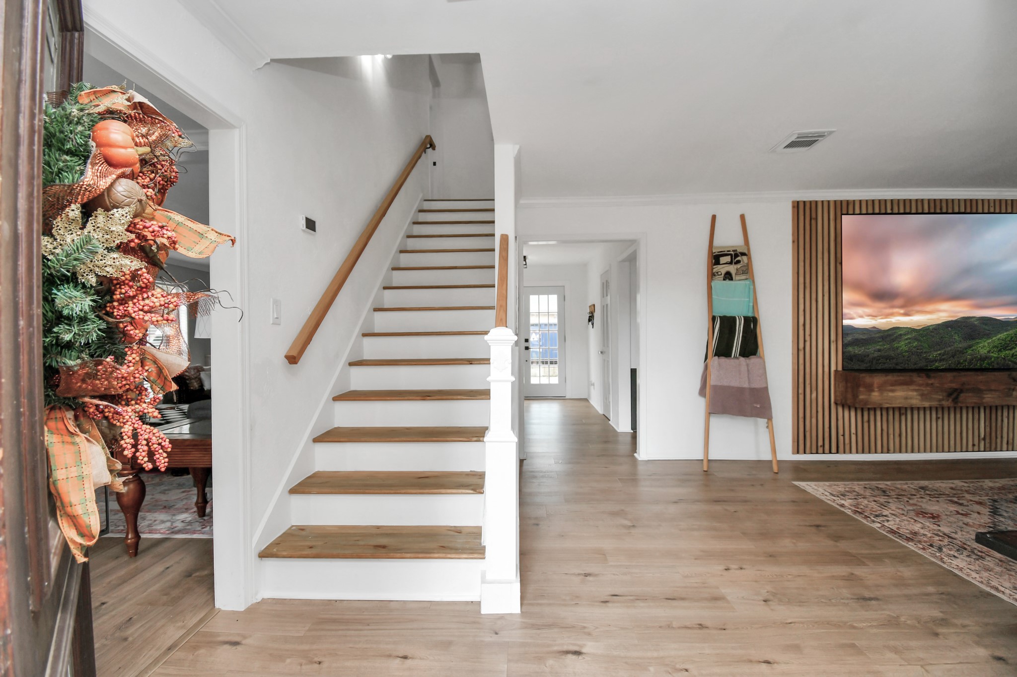 7502 Ralick Court Spring, TX 77379 - Photo 7 of 43 a view of entryway with wooden floor