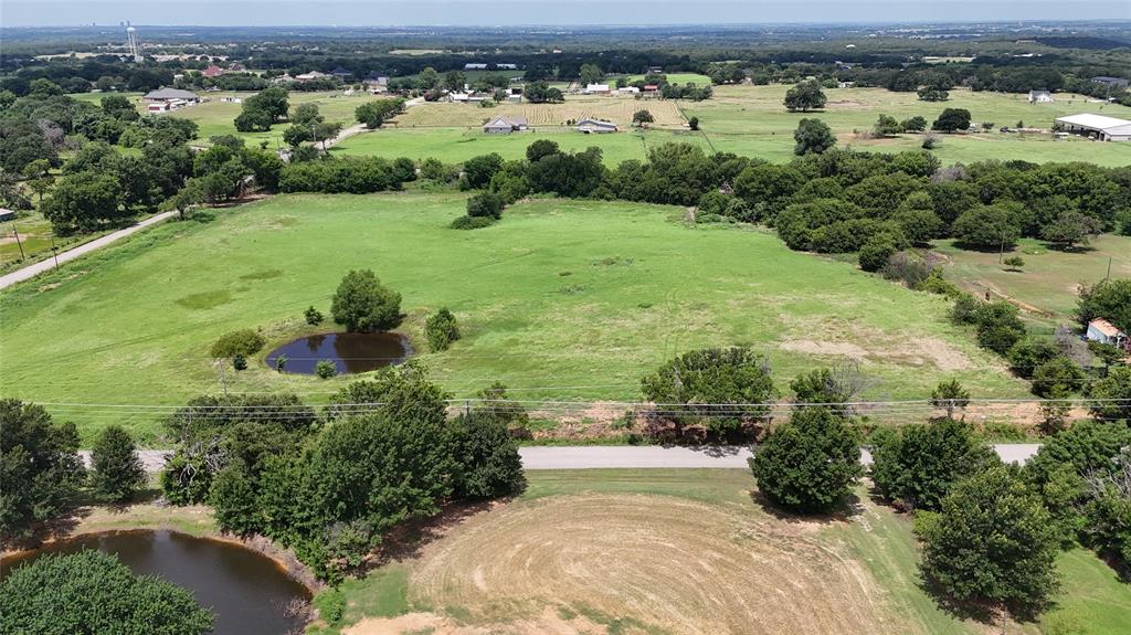 Lot 2 New Hope Road Aubrey, TX 76227 - Photo 4 of 6 an aerial view of residential houses with outdoor space and trees